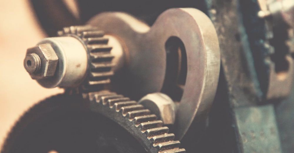 Gear - Detailed view of vintage industrial machinery gears showcasing precision engineering.