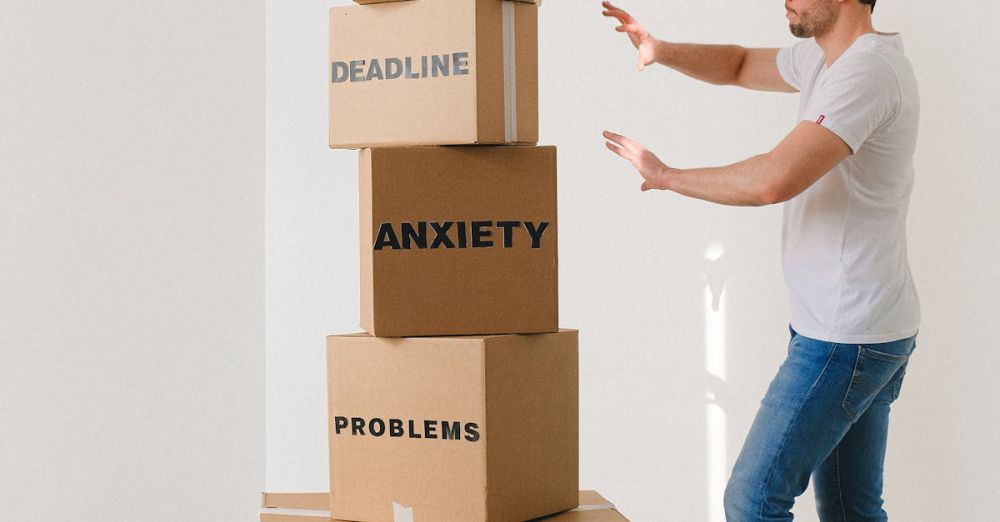 Subscription Boxes - A man in casual attire balances boxes labeled with stress-related words indoors.