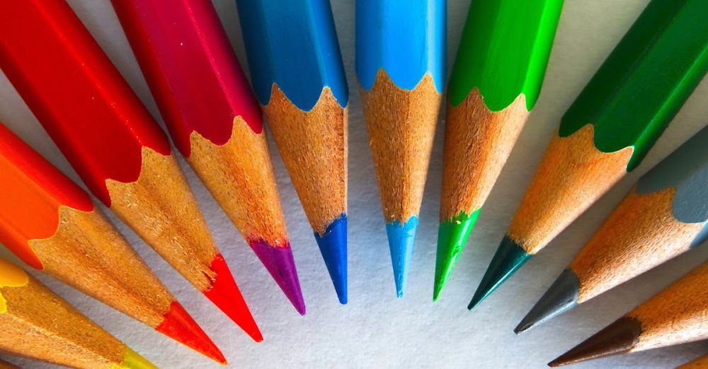 Tips - A vivid close-up of sharpened colored pencils arranged in a circular pattern.