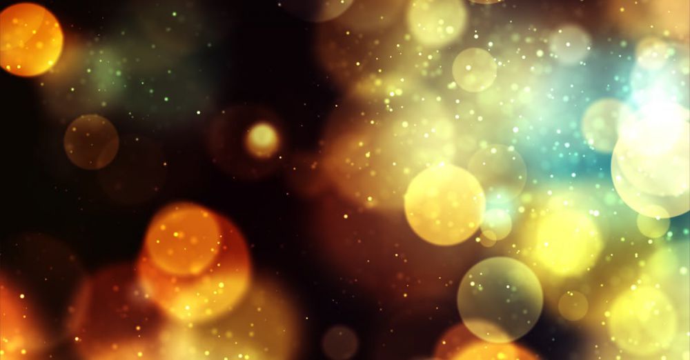 Lights - Vibrant bokeh background with golden and blue lights creates a magical and festive atmosphere.