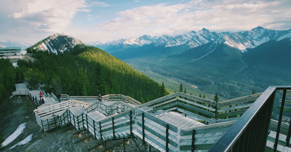 Rockies - Captivating mountain view from a wooden stairway in Banff National Park, Canada.