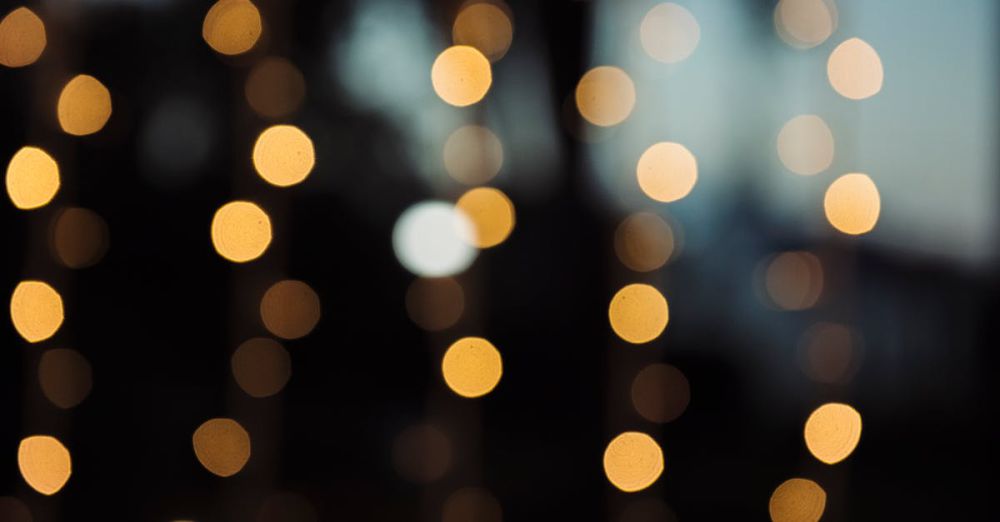 Lights - A warm and abstract defocused background with circular bokeh lights.