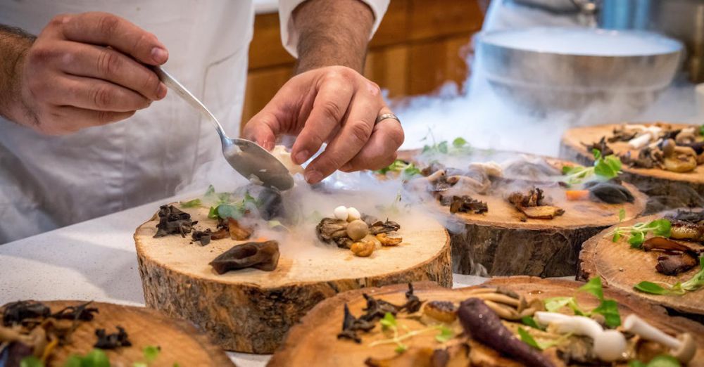 Chef - A chef artfully plating a gourmet dish with mushrooms and greens on wood slices.