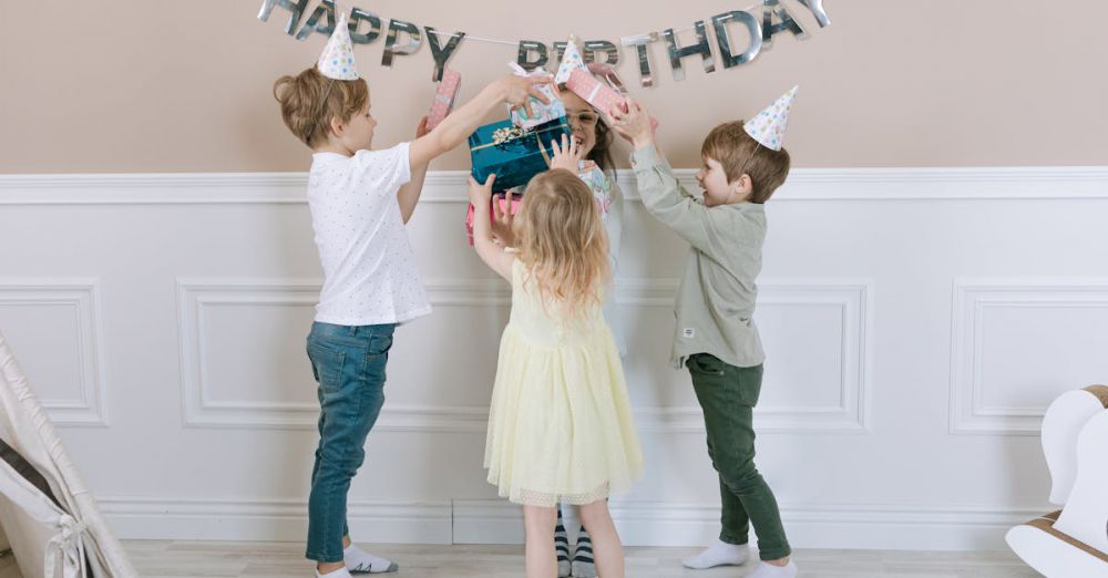 Preteens - Joyful children celebrate a birthday, exchanging gifts indoors.