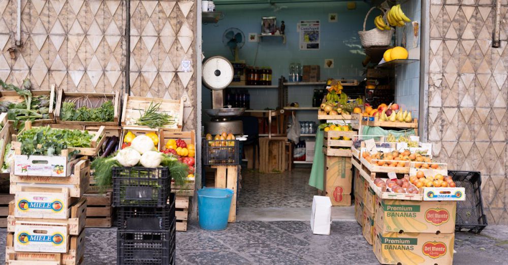 Marketplaces - A vibrant display of fruits and vegetables at a traditional market stand, showcasing fresh produce in crates.