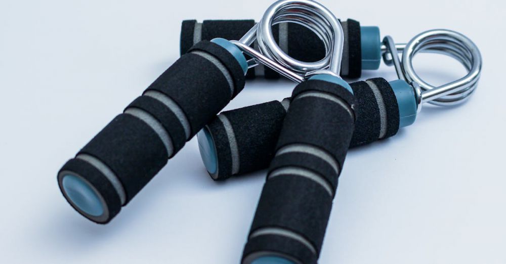 Workout Gear - Close-up of foam handle hand grippers for enhancing grip strength during workouts.