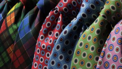 Ties - A vibrant assortment of patterned neckties displayed together. Ideal for fashion themes.