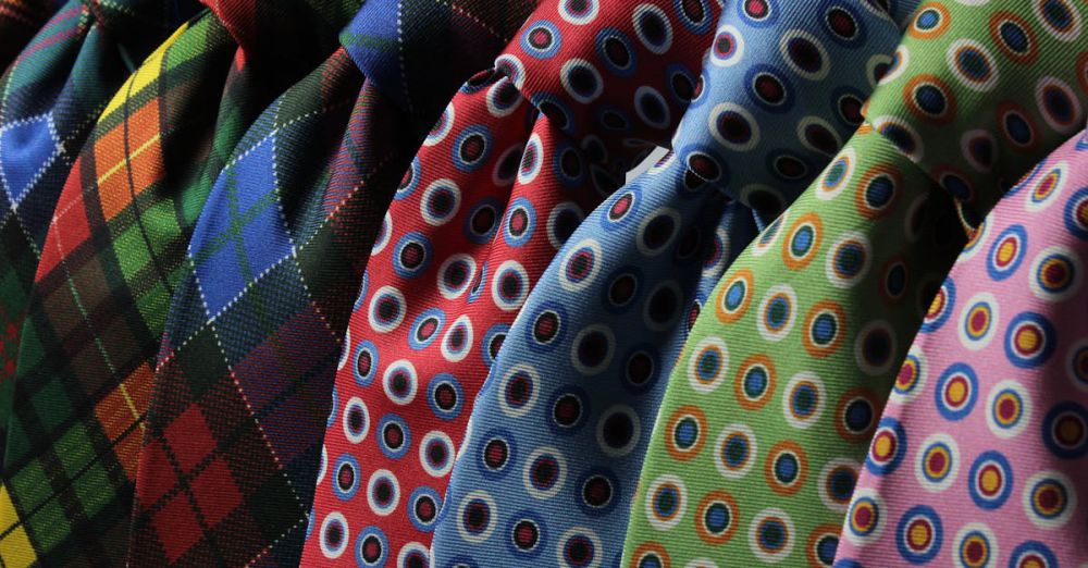 Ties - A vibrant assortment of patterned neckties displayed together. Ideal for fashion themes.