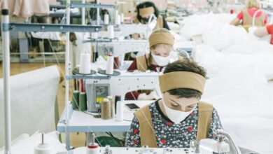 Headbands - Women working with sewing machines in a textile factory, focused on production.