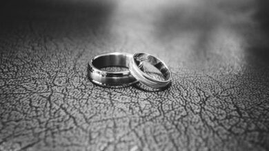 Rings - Elegant black and white close-up of wedding rings symbolizing love and commitment.