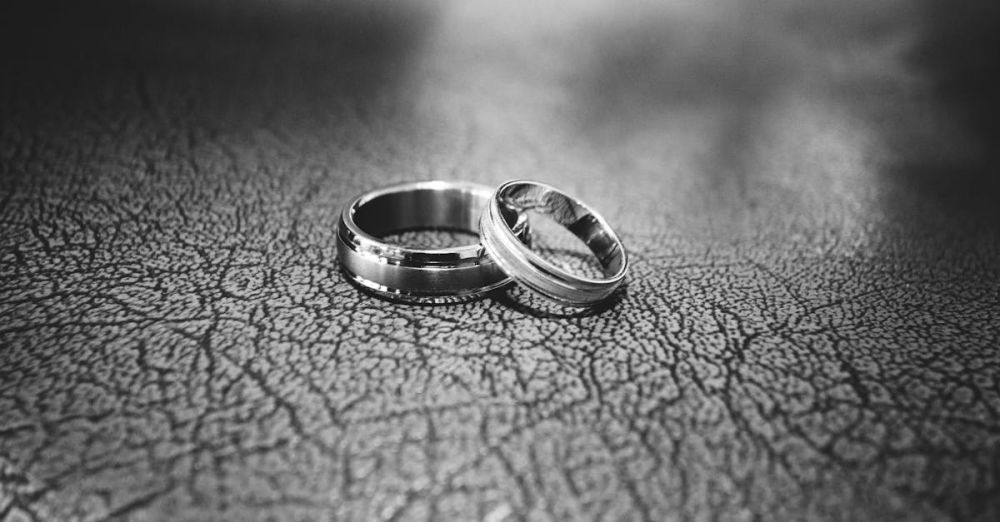 Rings - Elegant black and white close-up of wedding rings symbolizing love and commitment.