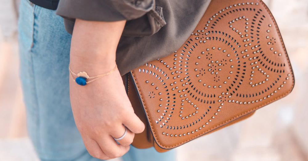 Accessories - Close-up of a stylish handcrafted bag with a detailed bracelet, reflecting Moroccan elegance and fashion.