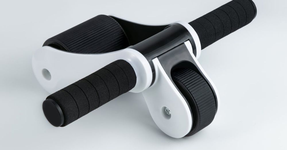 Ab Rollers - Close-up of a dual wheel ab roller with black handles on a white background, ideal for fitness routines.