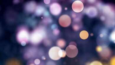 Lights - Vibrant abstract bokeh background with colorful lights and sparkles.