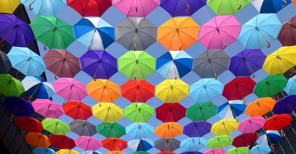 Umbrellas - Bright and colorful arrangement of umbrellas creating a vibrant canopy.