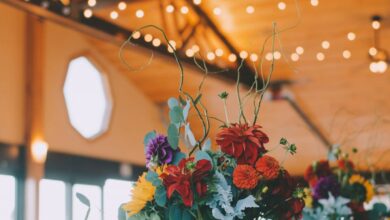 Gazebos - Bright florals and soft lighting create a cozy atmosphere in a stylish café setting.