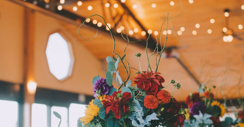 Gazebos - Bright florals and soft lighting create a cozy atmosphere in a stylish café setting.