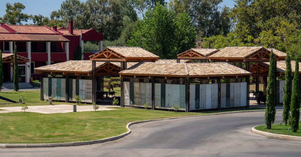 Pergolas - Beautiful wooden pergolas in a lush garden setting of a Corfu resort, perfect for relaxation.