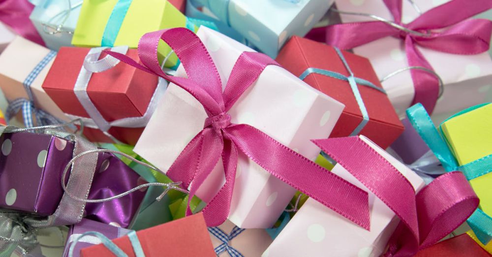 Gifts - A vibrant collection of gift boxes with colorful ribbons, ideal for celebrations.