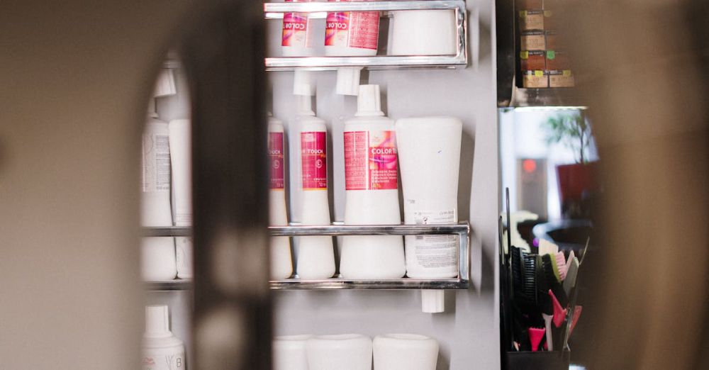 Self-Care Boxes - Close-up view of salon shelves showcasing various hair and beauty products.