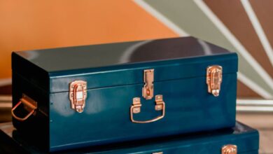 Travel Boxes - Two vintage blue storage chests set on a cozy carpet in modern indoor decor.