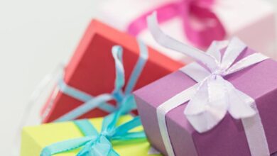 Gifts - Close-up of vibrant gift boxes with ribbons, perfect for festive occasions.