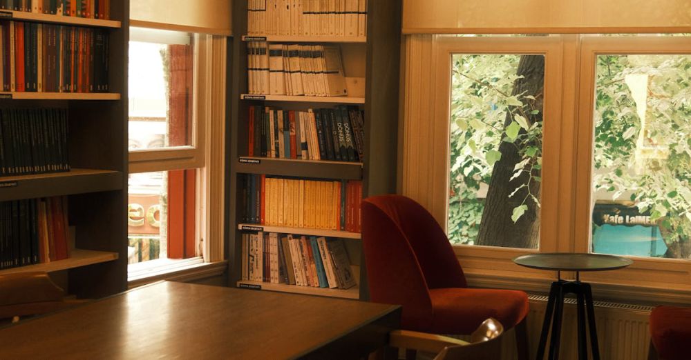 Recliners - Stylish library room with bookshelves and warm lighting, perfect for reading and studying.