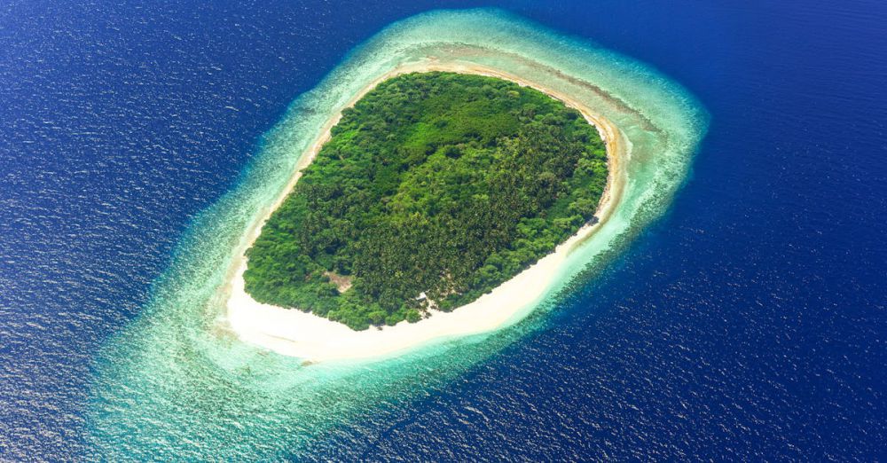 Hammocks - Explore the stunning tropical island surrounded by turquoise waters in this aerial photograph.