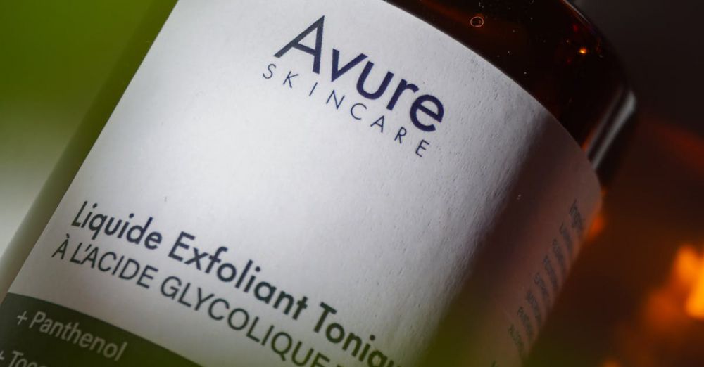 Toners - Close-up of Avure skincare glycolic acid exfoliating serum bottle with aloe vera.