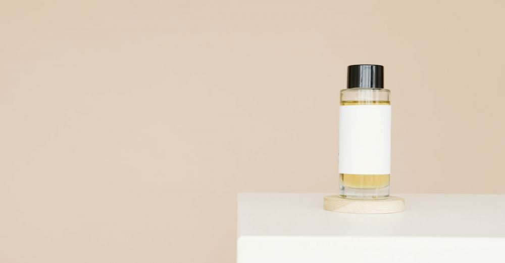 Hair Serums - A sleek cosmetic bottle with blank label on a clean white platform against a neutral background.