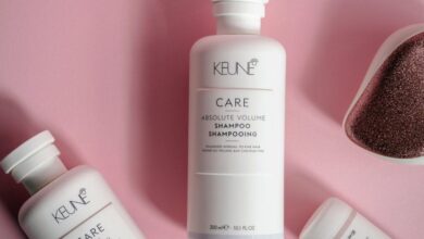 Volume Products - Stylish display of Keune hair care products on a pink background, emphasizing elegance and luxury.