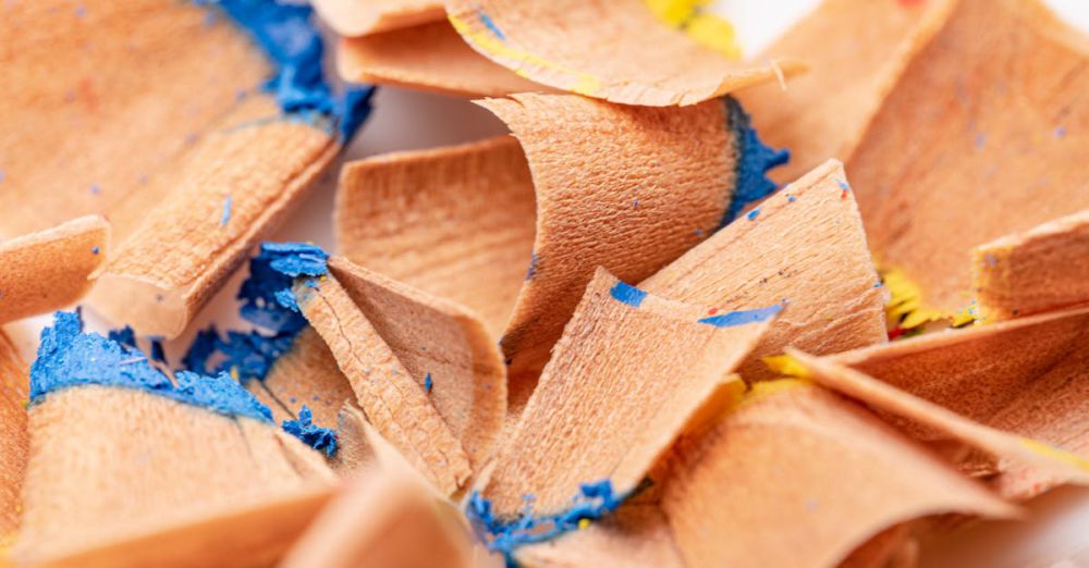 Edging Tools - Close-up of colorful pencil shavings, showcasing vibrant and textured wooden curls.