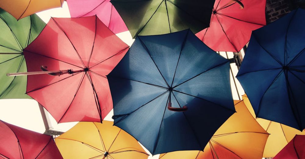 Umbrellas - Vibrant umbrellas create a colorful canopy in Greater London, offering protection from sun and rain.