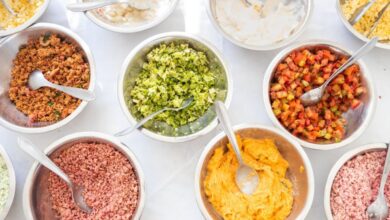 Mixing Spoons - Top view of assorted colorful ingredients in bowls, ideal for food photography and culinary inspiration.