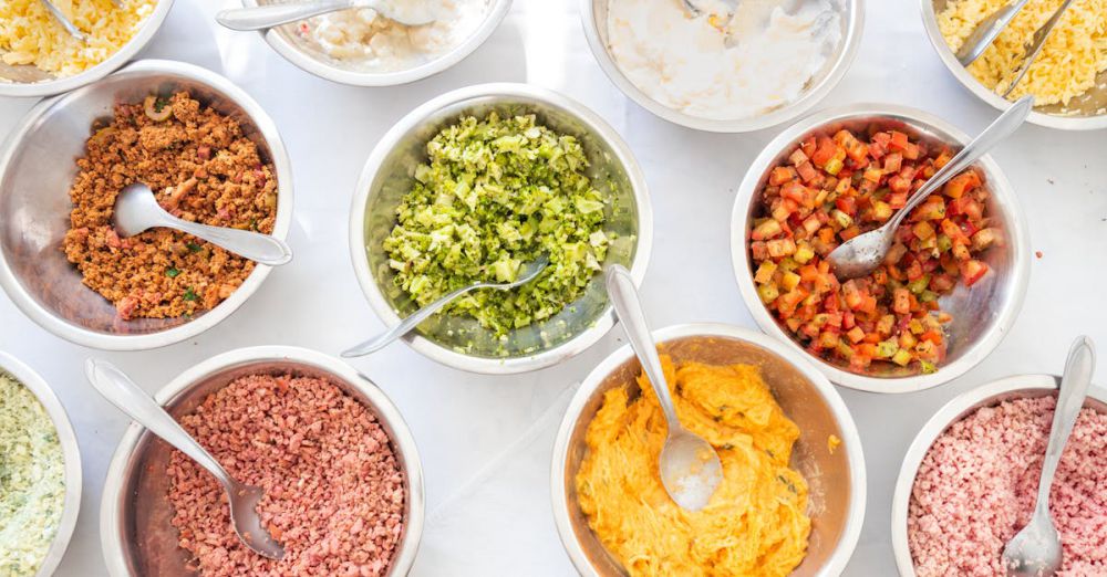 Mixing Spoons - Top view of assorted colorful ingredients in bowls, ideal for food photography and culinary inspiration.