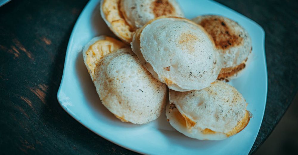 Dough Products - A close-up view of freshly baked bread pieces on a white plate, ideal for food photography.