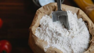 Pasta Tools - A cozy kitchen scene showcasing flour and pasta for cooking, captured from a high angle.