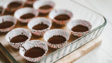 Cupcake Liners - Glass dish with empty muffin liners ready for baking. Ideal for food preparation concepts.