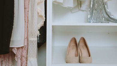 Closet Organizers - Elegant wardrobe showcasing luxury fashion with beige shoes and delicate clothing.