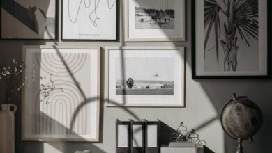 Hanging Organizers - A stylish and modern interior featuring framed art prints, a globe, and decor items on a wooden surface.