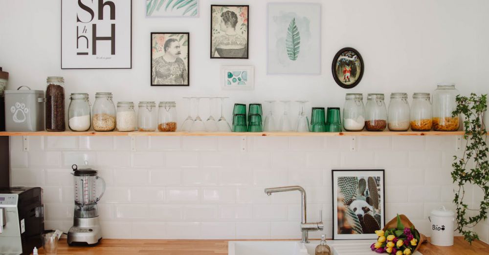 Canisters - Contemporary kitchen in Estonia featuring wooden shelves, decor elements, and glass jars above a sink.