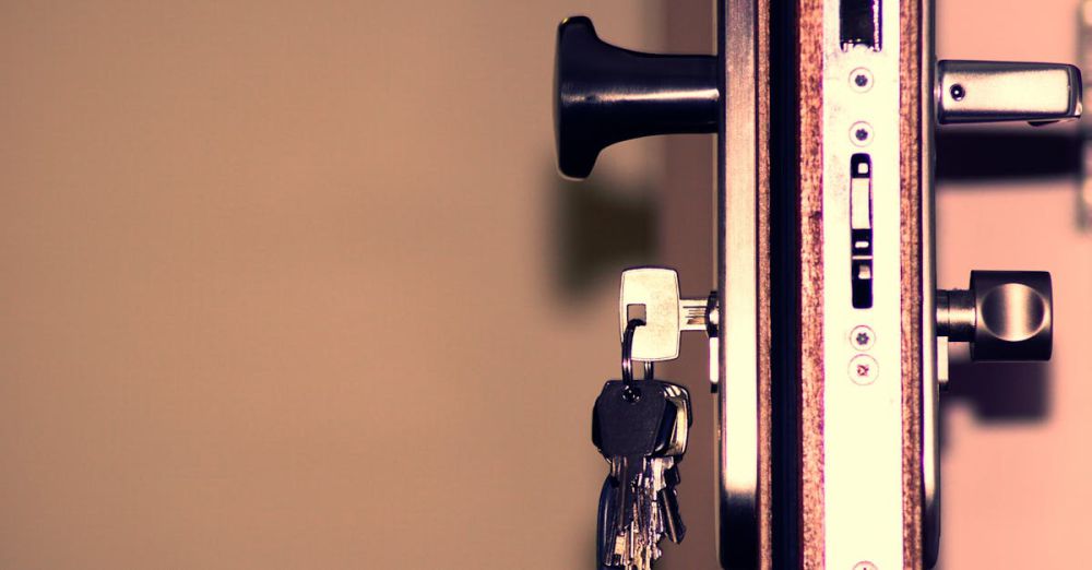 Locks - Detailed view of a door lock and keys emphasizing security and access.