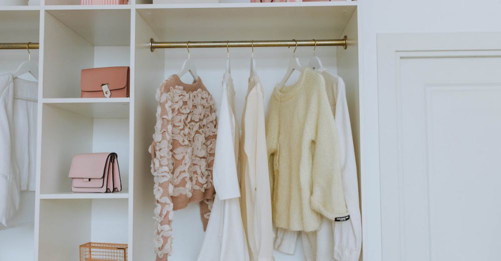 Folding Bags - Neat closet showcasing white and pink clothes and accessories for a chic, clean look.