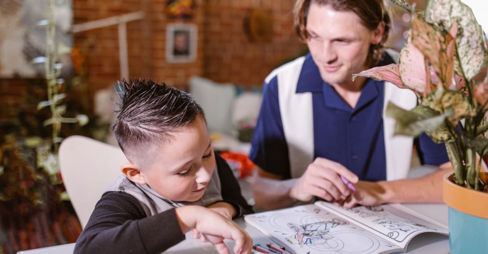 Coloring Books - An adult and child bonding over a coloring activity indoors. Enhancing creativity and family time.