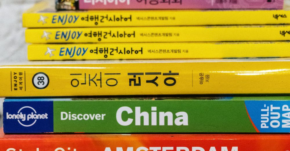 Language Books - A colorful stack of travel guides and language books for global explorers.